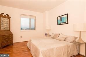 bedroom featuring hardwood / wood-style flooring