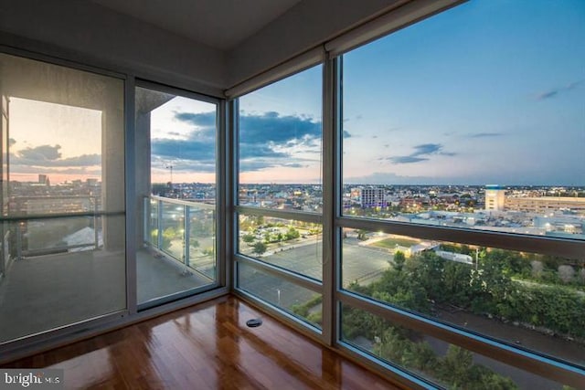 unfurnished sunroom featuring a wealth of natural light