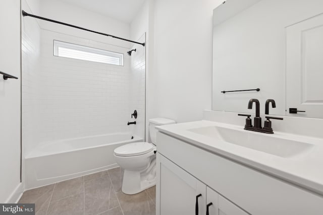 full bathroom with toilet, vanity, and tiled shower / bath combo