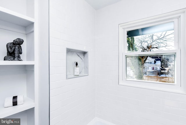 bathroom with walk in shower