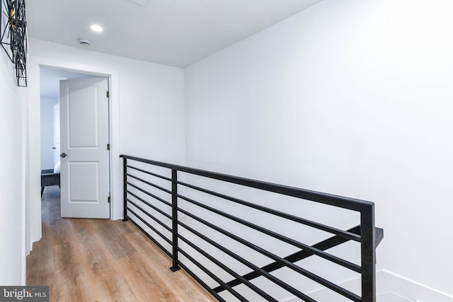 hallway featuring wood-type flooring