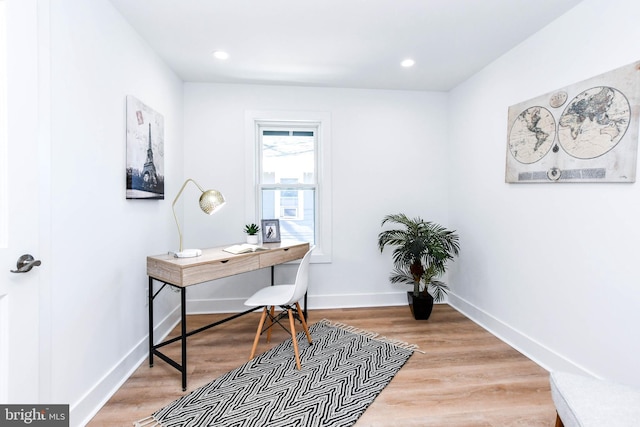 office area with hardwood / wood-style flooring