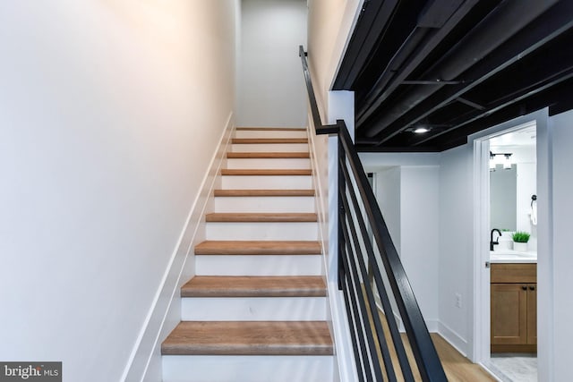 staircase with sink