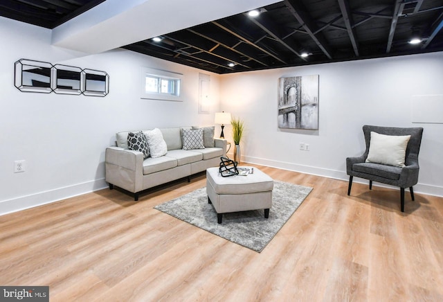 living room with light hardwood / wood-style flooring