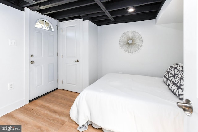 bedroom featuring wood-type flooring