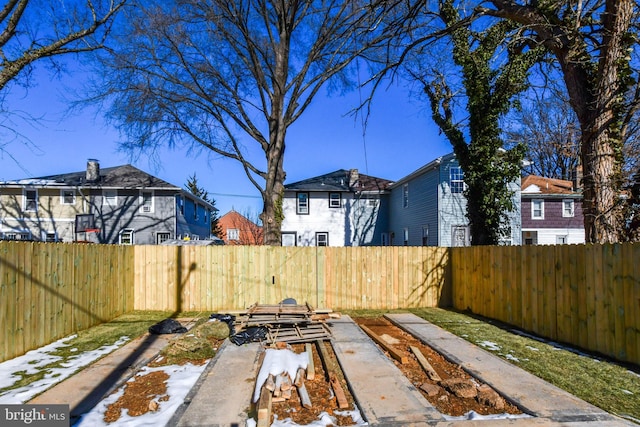 view of yard covered in snow