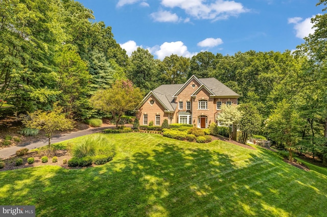 view of front of home with a front lawn