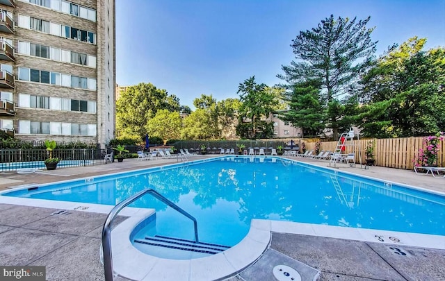 view of pool with a patio area