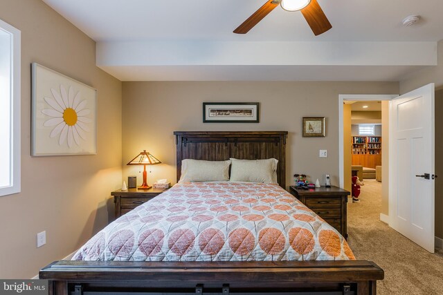 carpeted bedroom featuring ceiling fan