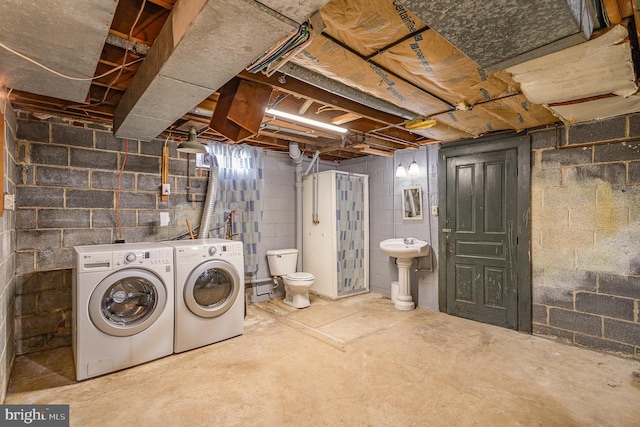 washroom with laundry area and washing machine and clothes dryer