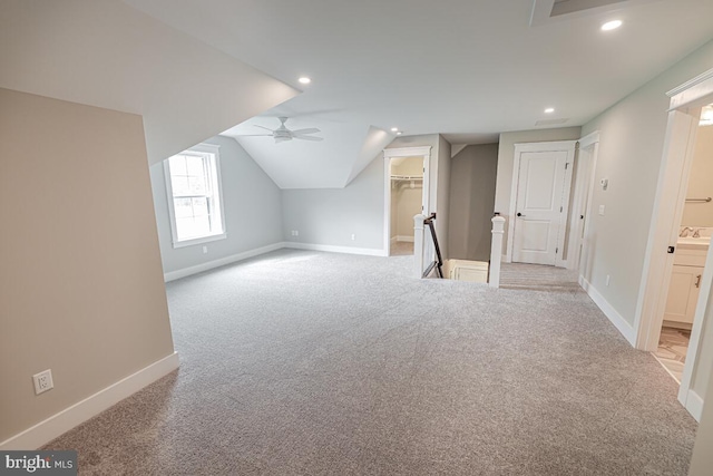 bonus room with baseboards, light colored carpet, ceiling fan, vaulted ceiling, and recessed lighting