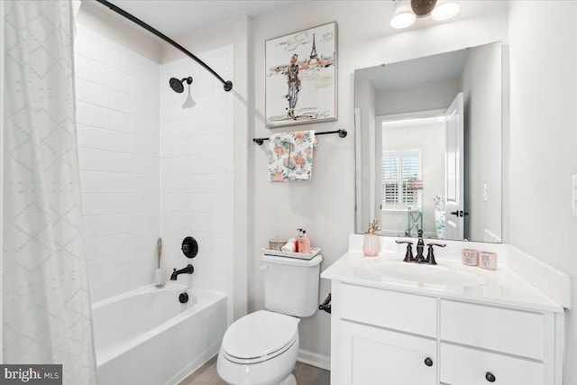 bathroom featuring shower / bathtub combination with curtain, vanity, baseboards, and toilet