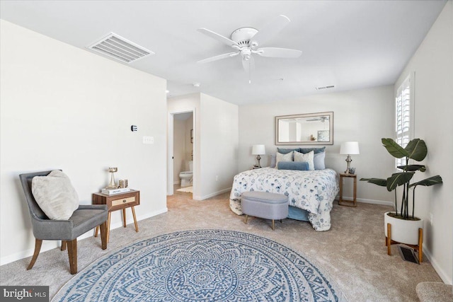 bedroom featuring light carpet, baseboards, and visible vents