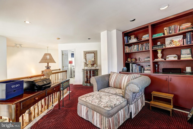 sitting room featuring carpet