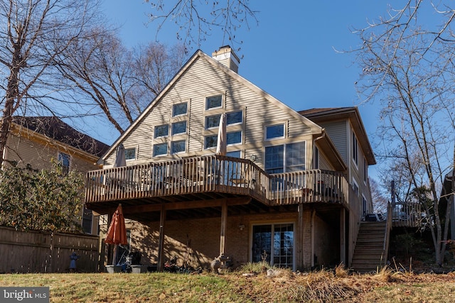 rear view of house with a deck