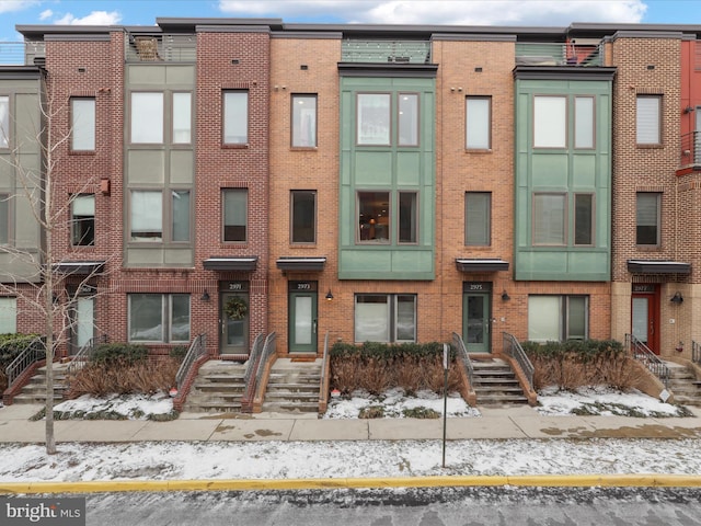 view of snow covered building