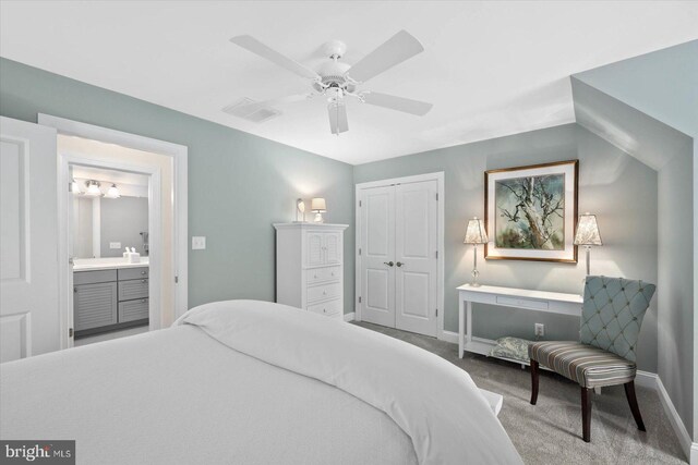 bedroom featuring ceiling fan, a closet, and carpet