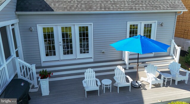 wooden terrace featuring french doors