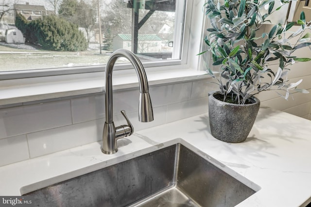 room details with sink and light stone counters