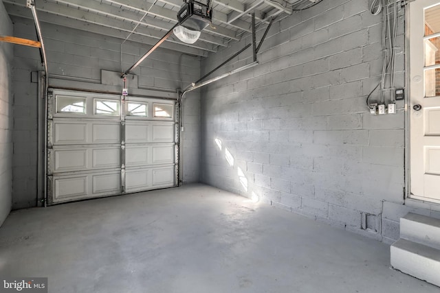 garage featuring a garage door opener