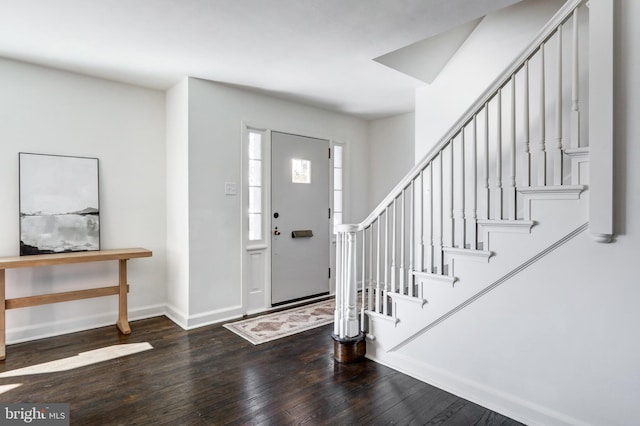 foyer featuring dark wood-type flooring