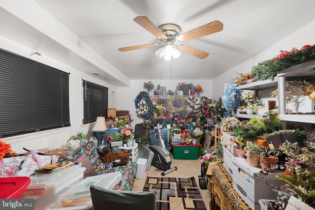 misc room featuring carpet and ceiling fan