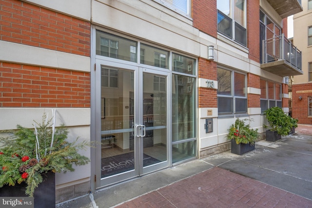 entrance to property featuring french doors