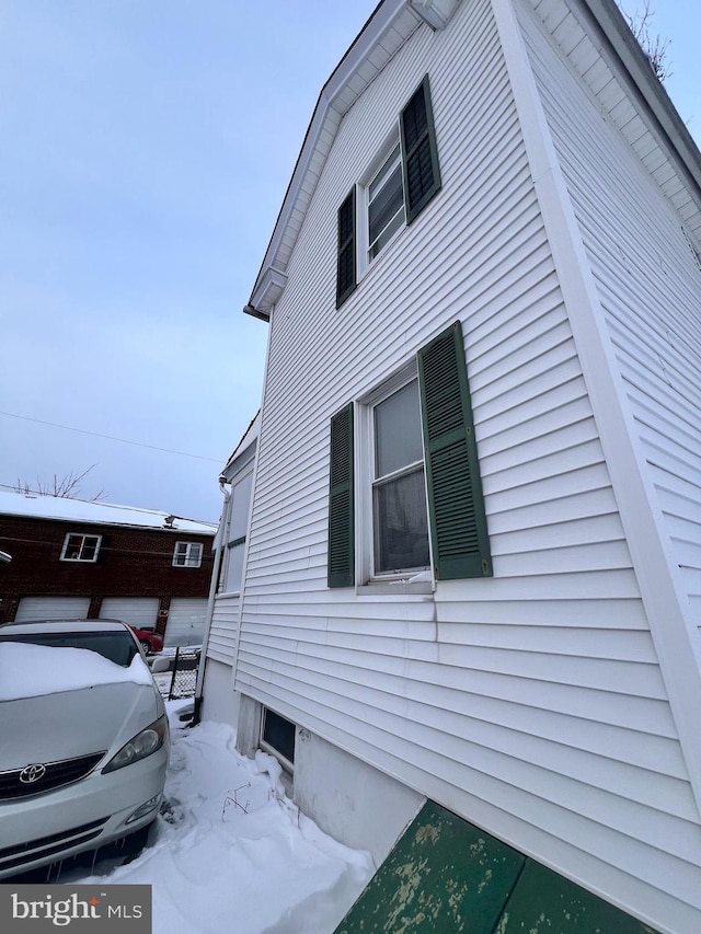 view of snow covered property