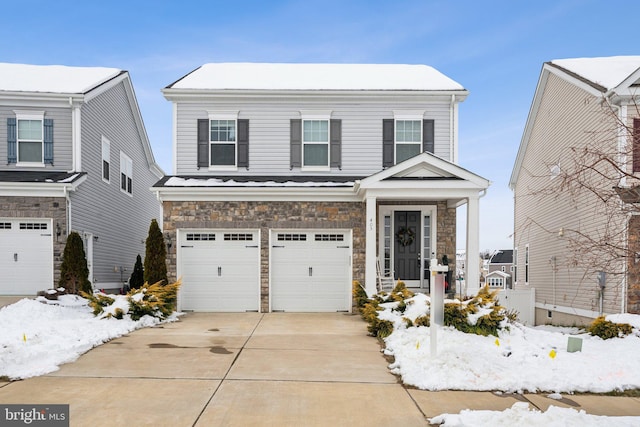 view of front of property featuring a garage