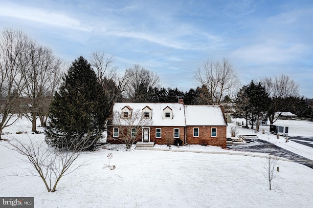 view of new england style home