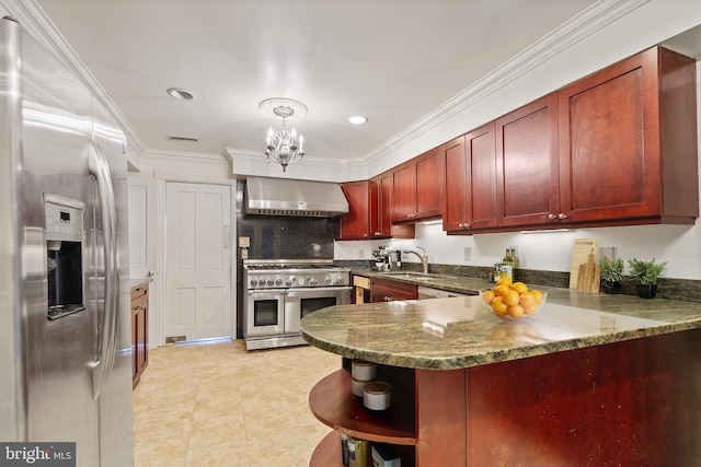 kitchen featuring wall chimney range hood, stainless steel appliances, kitchen peninsula, and ornamental molding