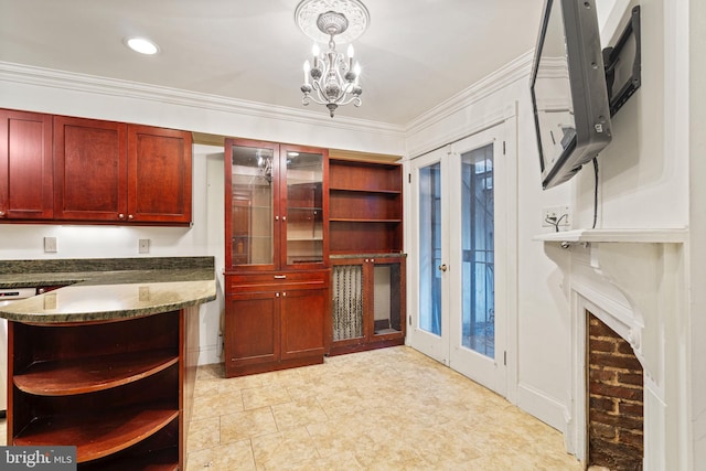 kitchen featuring crown molding, dishwasher, french doors, an inviting chandelier, and pendant lighting