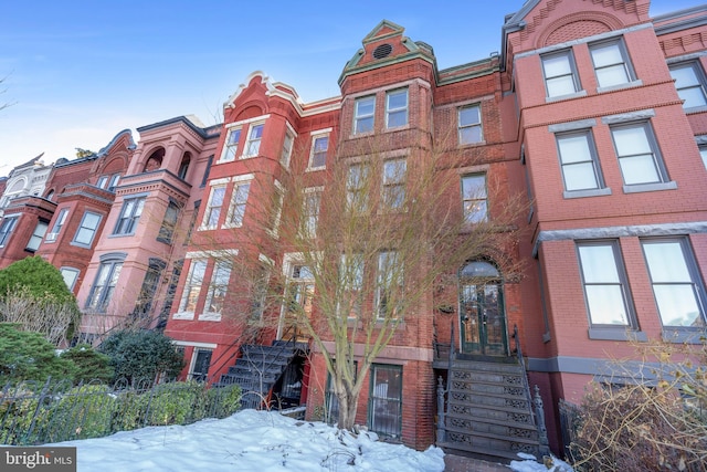 view of snow covered building