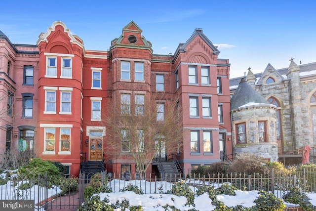 view of snow covered building