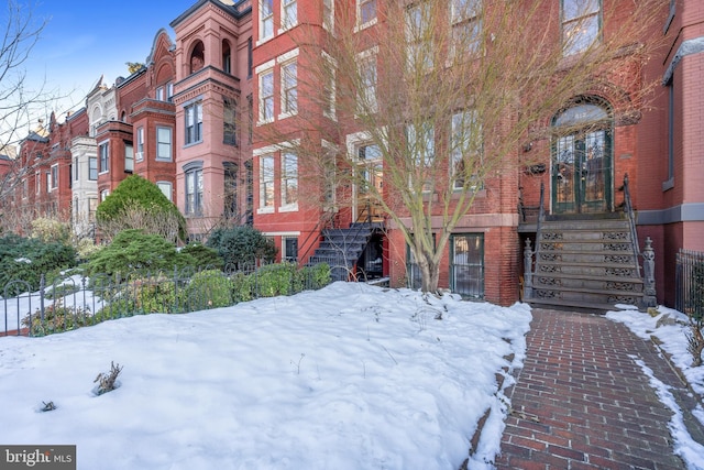 view of snow covered building