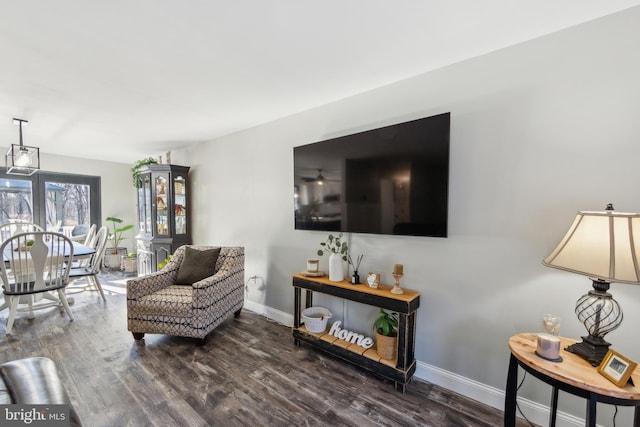 living room with dark hardwood / wood-style floors