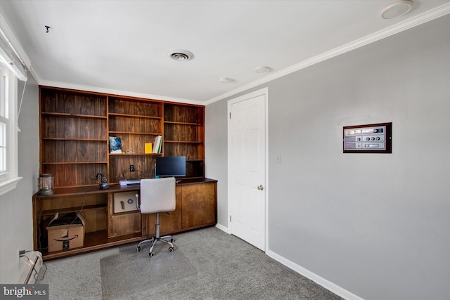 carpeted office space featuring a baseboard heating unit and ornamental molding