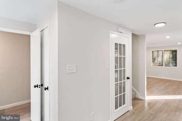 hall featuring light hardwood / wood-style floors