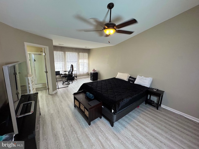 bedroom with ceiling fan and light hardwood / wood-style floors