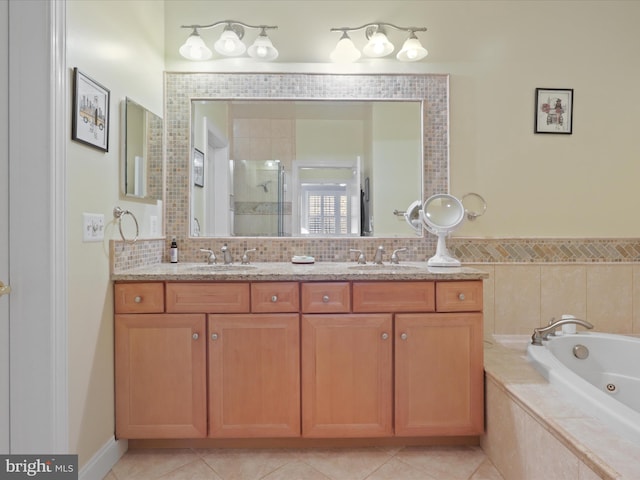 bathroom featuring decorative backsplash, vanity, tile patterned floors, and separate shower and tub