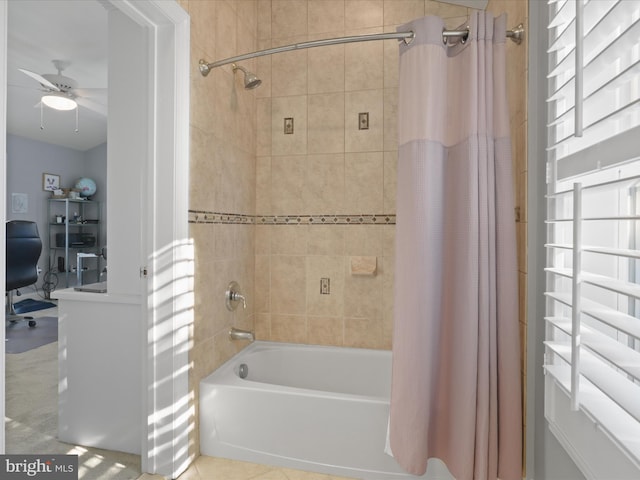 bathroom featuring ceiling fan and shower / bathtub combination with curtain