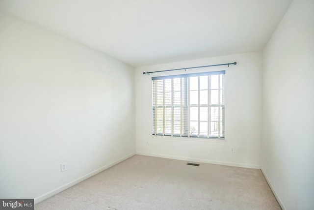 spare room with carpet flooring