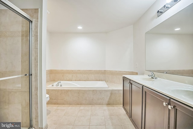 full bathroom with tile patterned flooring, vanity, toilet, and shower with separate bathtub