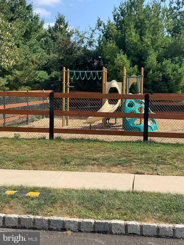 view of play area featuring a yard