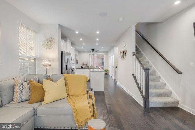 living area with stairway, dark wood-style floors, baseboards, recessed lighting, and ceiling fan