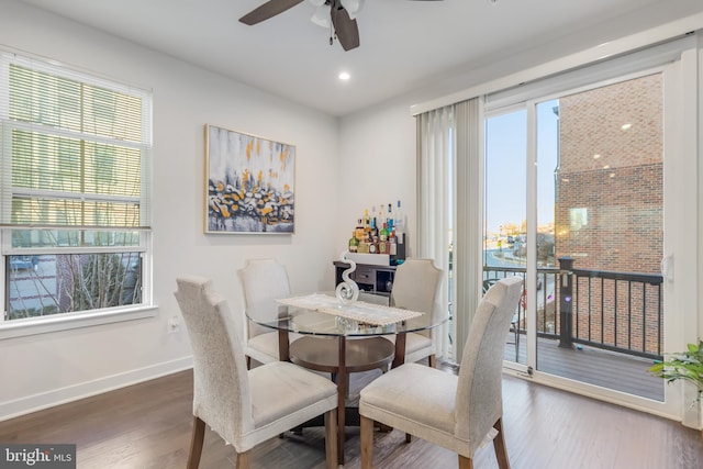 dining area featuring recessed lighting, baseboards, wood finished floors, and a ceiling fan