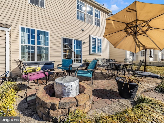 view of patio featuring an outdoor fire pit