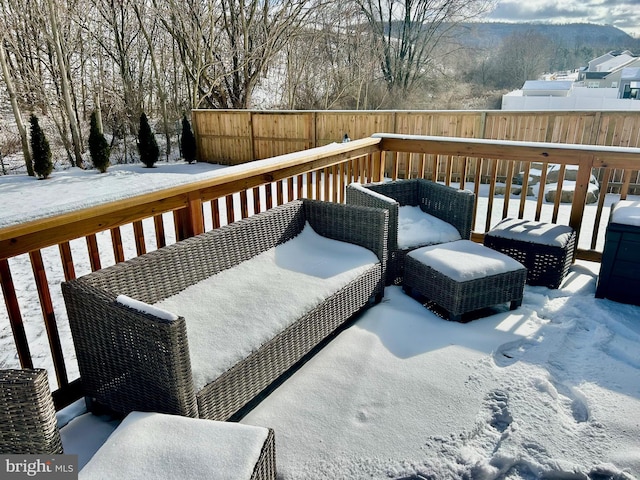 view of snow covered deck