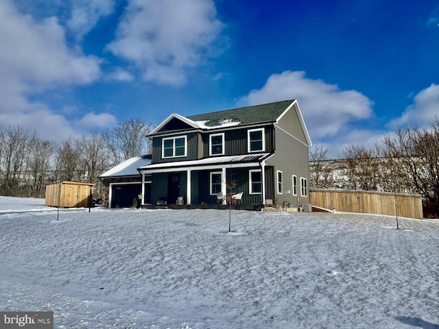 view of front of property featuring covered porch