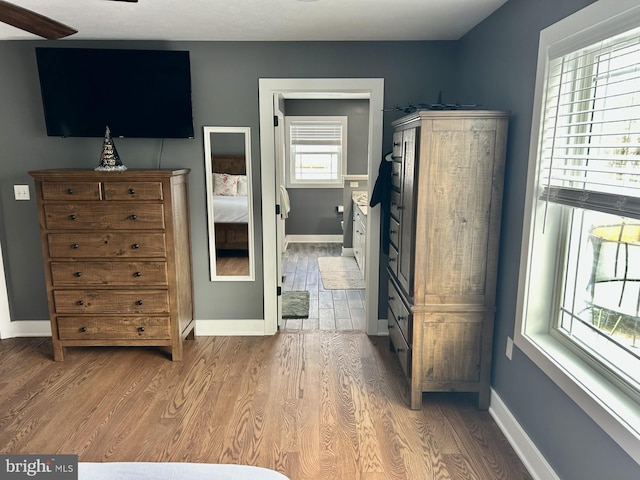 bedroom featuring wood-type flooring